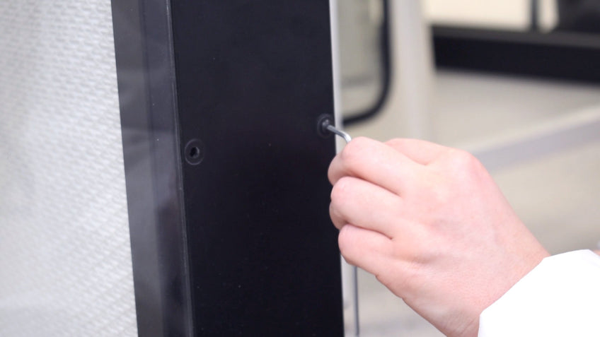 Attach the filter access panel using the screws and gaskets provided