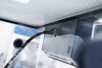 Ethernet cable can be fed through the feedthrough holes in the back or side panels.