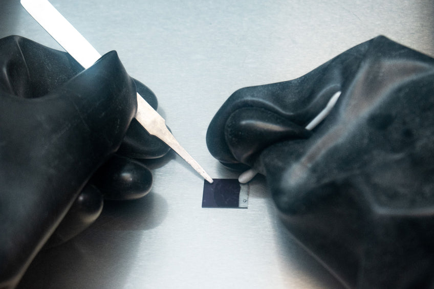 Wiping cathode clean with solvent
