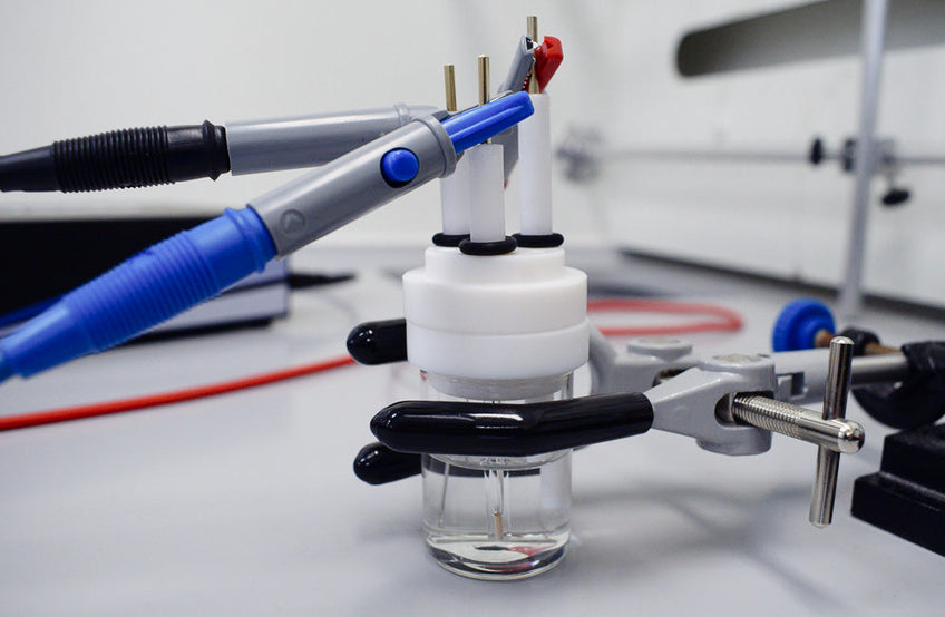 Three electrode electrochemical cell with electrodes