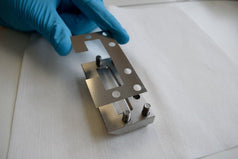 Placing a shim onto the head