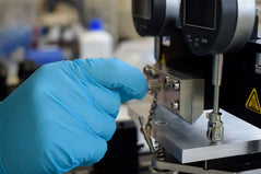 Attach the stainless-steel Luer lock adapter to the slot-die head.