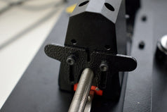 Plunger pusher with two sets of holes for different sized syringes