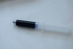 Solution filled syringe with no air bubbles