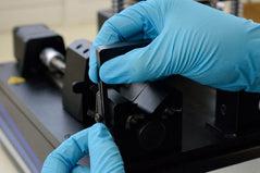 Removing the barrel clamp - undoing the wing nut.