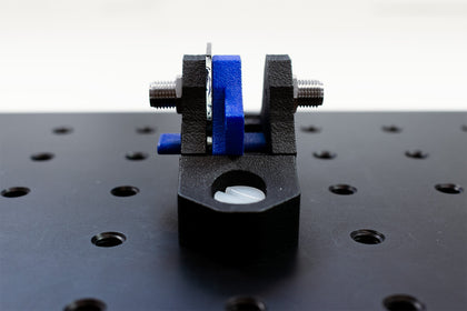 Fluorescence spectroscopy set up with four-port sample holder and optical filters